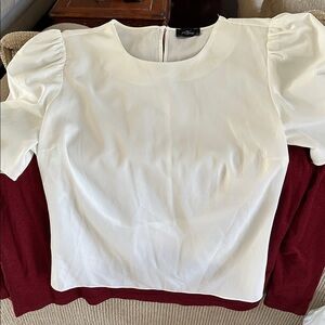 Chic White Blouse by [Brand]